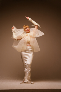 Cream bow dance